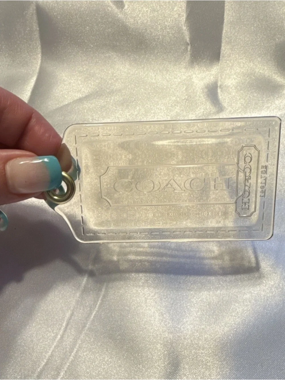Coach Clear Hangtag (Poppy).  3.5 in